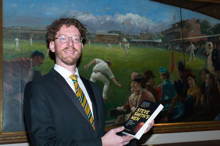 Geoff Lemon poses with his book, 2019.